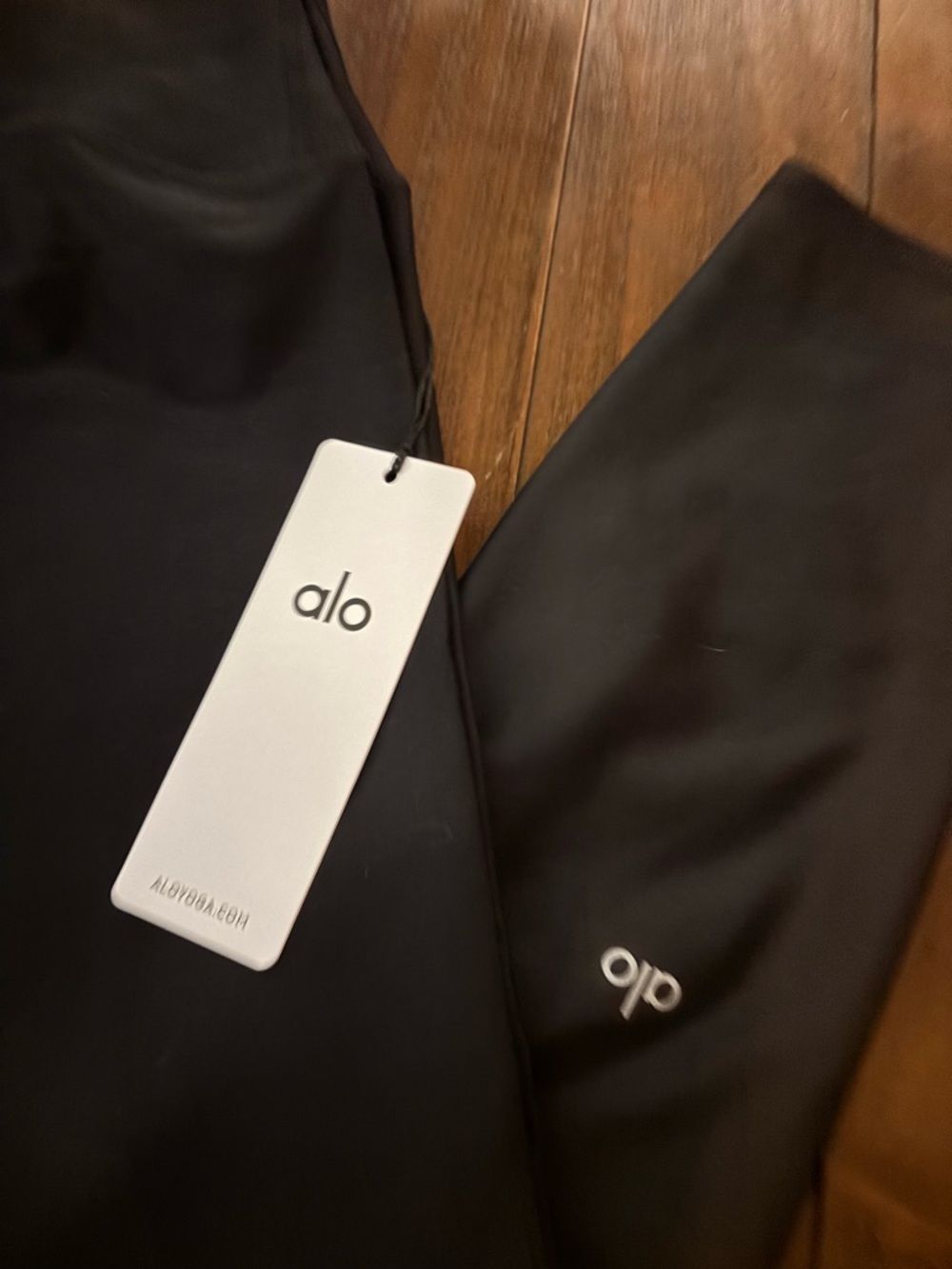 ALO Yoga Black High-Rise Leggings with Logo Tag